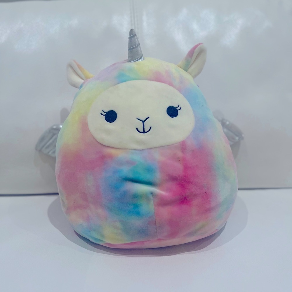 SQUISHMALLOW Lucy the Llama
UNICORN with Daisy Rainbow Pastel,
USED 8"